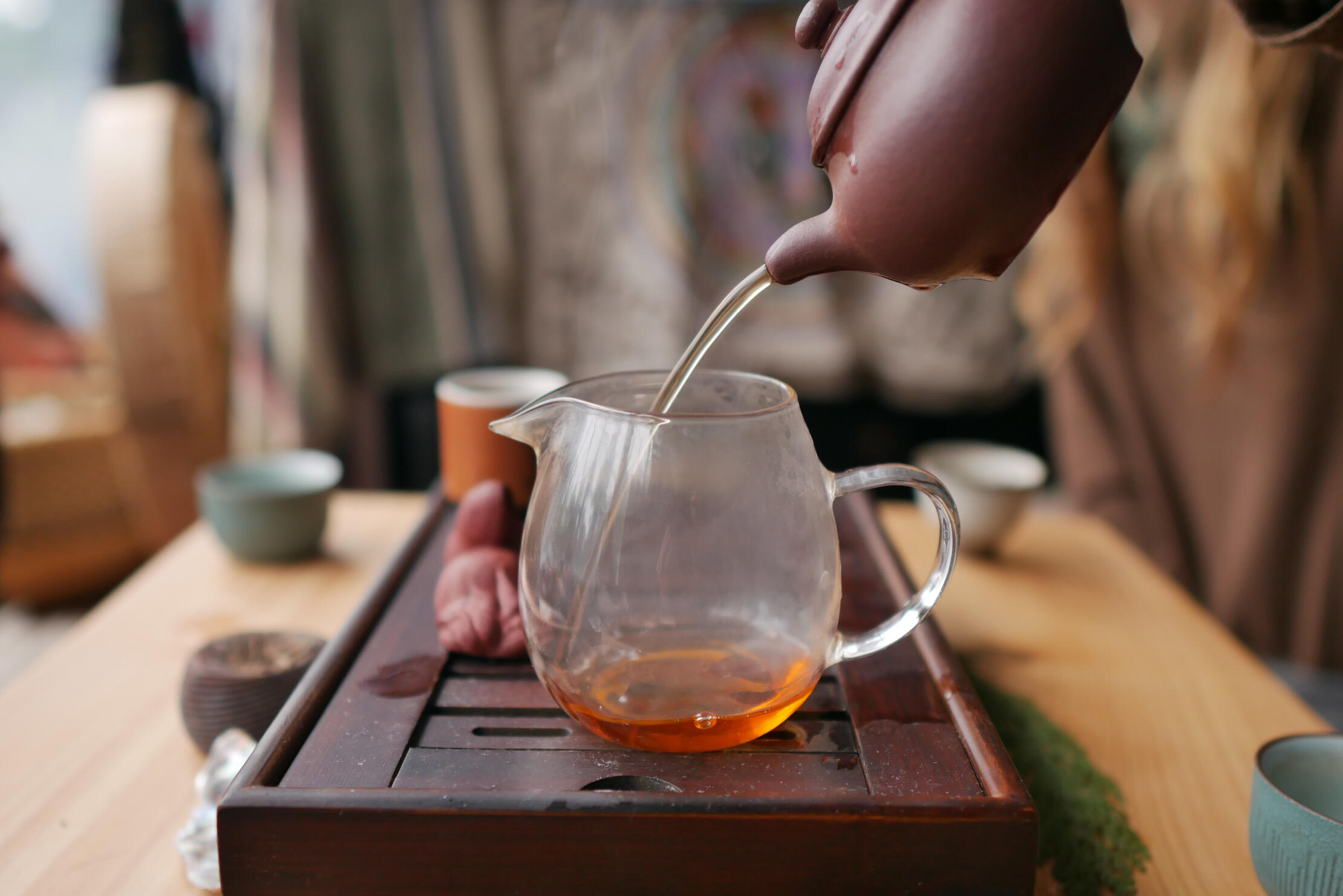 Gong Fu Cha Puerh Tea Ceremony 2 Gong Fu Cha Puerh Tea Ceremony - small teapot pours into glass beaker