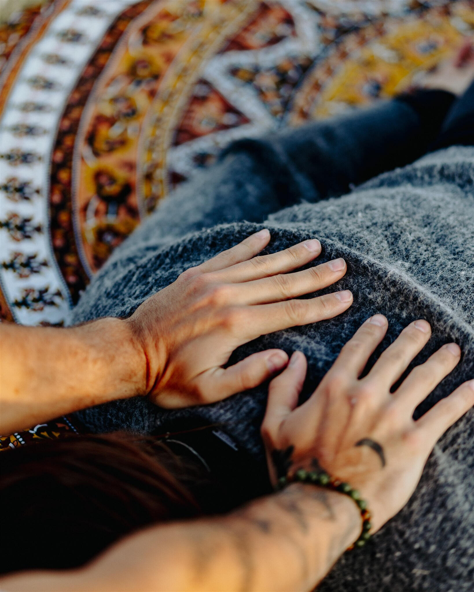 Healing hands applying Zenthai to the upper back Healing hands applying Zenthai to the upper back